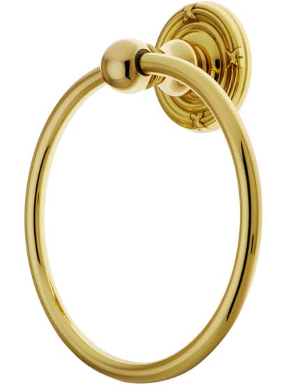 Brass Towel Ring with Ribbon and Reed Rosette in Polished Brass.